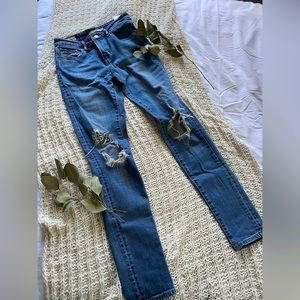 Levi 721 high rise distressed skinny jeans